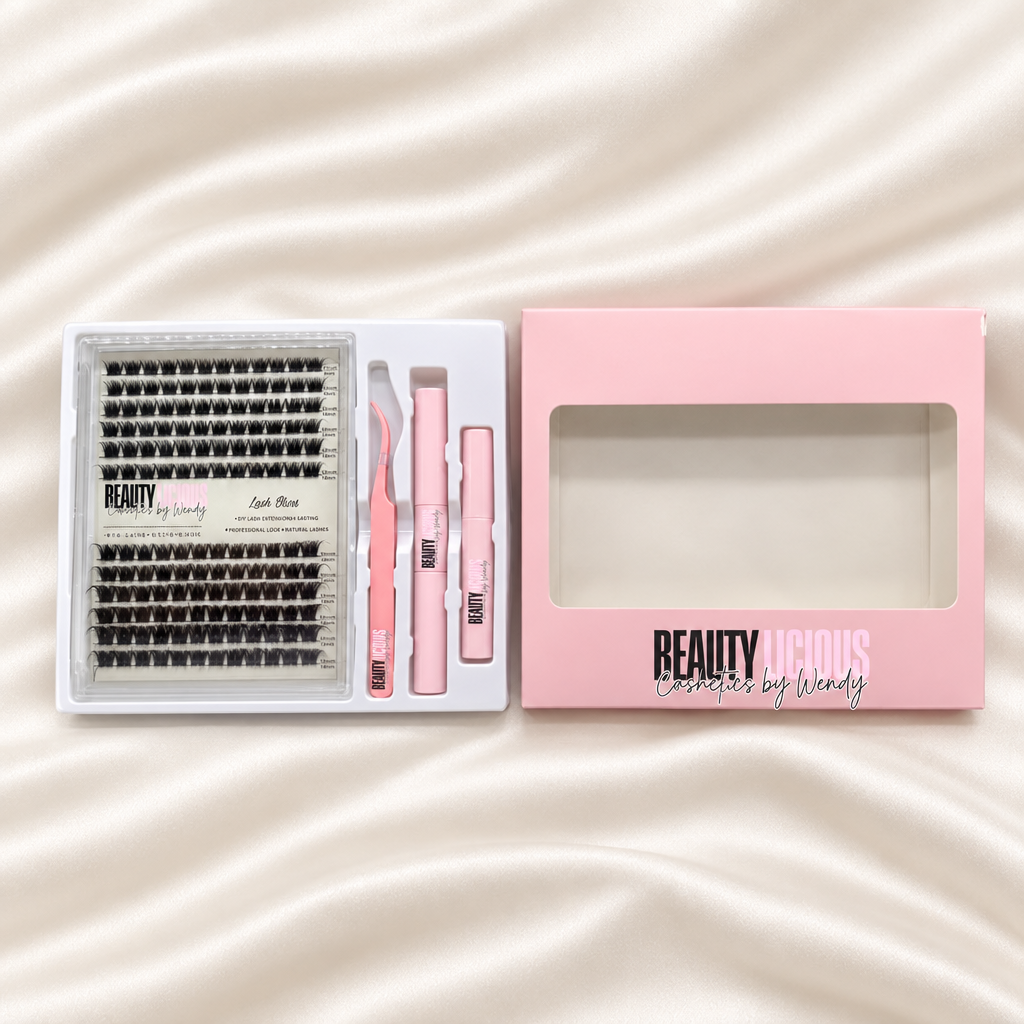 Beautylicious pink lash cluster kit with lashes and matching tools on soft ivory satin