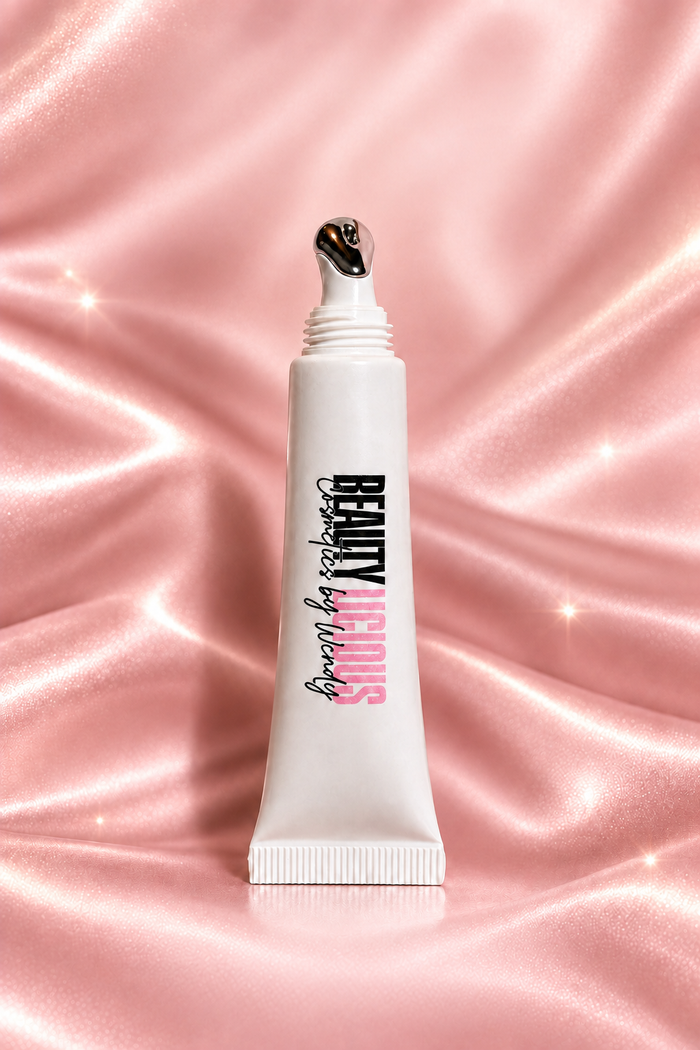 Lip gloss on pink satin without promotional wording